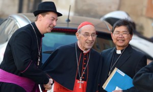 Ralph Napierski (L), a fake bishop poses
