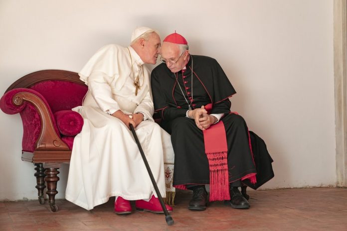 Film "The Two Popes" tentang diskusi mengenai membangun tembok atau mau berubah antara Paus Benedictus XVI dan Kardinal Bergoglio yang kemudian menjadi Paus Fransiskus. (Ist)