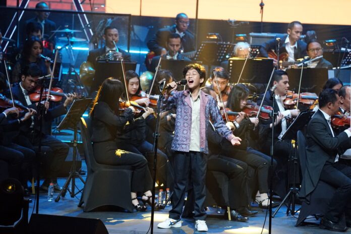 Penyanyi remaja Jordan Basa tampil di ajang gelaran musik bertema "The Magic of Christmas: An Enchanted Concert for Friends and Families", Sabtu10 Desember 2022. (Panitia konser PUKAT KAJ)